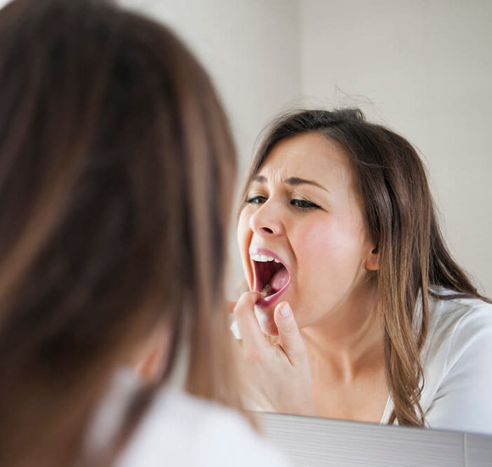Woman with Toothache